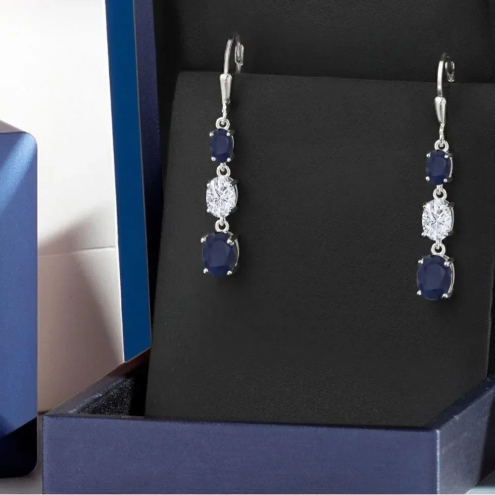 925 Sterling Silver with 6.51 Cttw 3 Stone Blue Sapphire and Moissanite Earrings